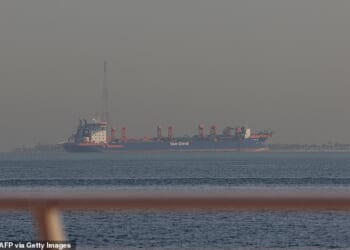 Iran has threatened to blow up oil tankers in the Strait of Hormuz (Pictured: An oil tanker offshore in Dubai on Sunday)