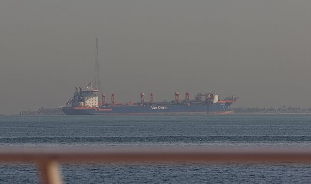 Iran has threatened to blow up oil tankers in the Strait of Hormuz (Pictured: An oil tanker offshore in Dubai on Sunday)