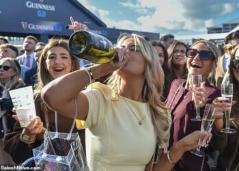 Plenty of bottle: Ladies Day at Cheltenham returned with a bang - and plenty of fizz