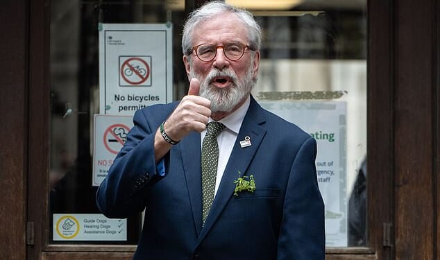 Former Sinn Fein president Gerry Adams gives the thumbs up as he arrives for his landmark civil trial