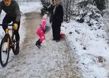 A father who was ordered to pay compensation to a cyclist for filming him as he knocked over his young daughter has finally won his legal battle. The Belgian cyclist (left) went viral after he was filmed kneeing the little girl as he rode past her and her family