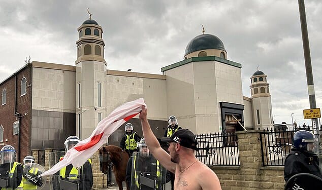 Protestors outside a mosque in Sunderland during nationwide disorder in the wake of the Southport stabbings in summer 2024