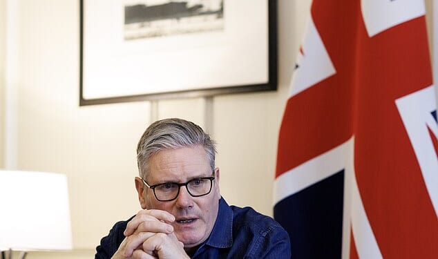 Prime Minister Sir Keir Starmer pictured holding a series of calls with international leaders in his office in 10 Downing Street yesterday