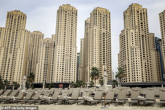 Empty sunbeds on the beach in the Jumeirah Beach Residence in Dubai on Wednesday