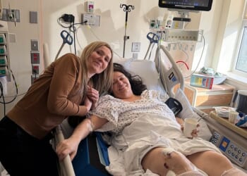 Air Canada flight attendant Solange Tremblay is seen with her daughter Sarah Lépine in her hospital bed in New York City. Both her legs are shattered, her spine is fractured and she will require multiple surgeries to treat her injuries