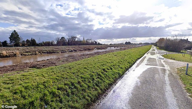 A frantic search is on for two missing teenagers after a car with five youngsters inside plunged into a river near a road in Wisbech St Mary, Cambridgeshire, pictured