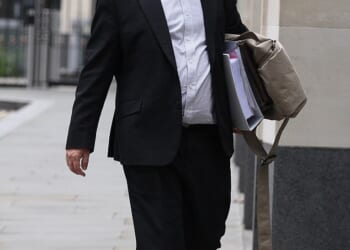 Steven Long, 59, pictured outside the High Court after tricking pensioners out of £11million to pay for his luxury lifestyle