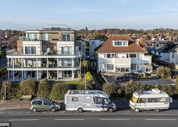 Residents living in a premium community on the south coast have become incensed by a long line of campervans parked directly outside their homes