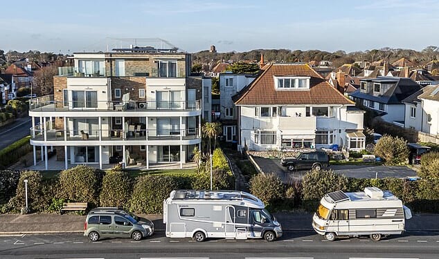 Residents living in a premium community on the south coast have become incensed by a long line of campervans parked directly outside their homes