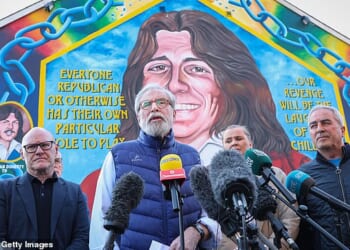 Gerry Adams held a press conference in front of a mural dedicated to Irish republican hunger striker Bobby Sands on west Belfast's Falls Road after a civil claims case against him was dropped