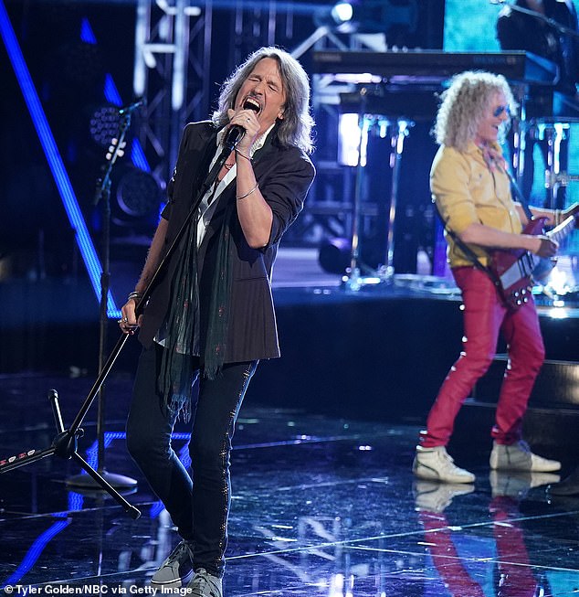 The classic rock band had invited the Sioux Falls Children's Choir on stage that day, but their production team was not equipped to have her wheelchair on stage, despite ample warning about it (lead singer Kelly Hansen performing on The Voice)