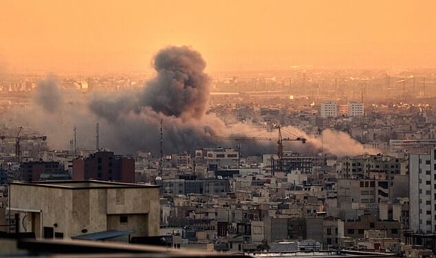 Smoke rises in Tehran as the US and Israel continue its co-ordinated attack on Iran