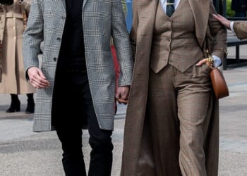 Hannah Waddingham, 51, held hands with spine surgeon Nick Beresford-Cleary as they arrived at Cheltenham Festival on Friday