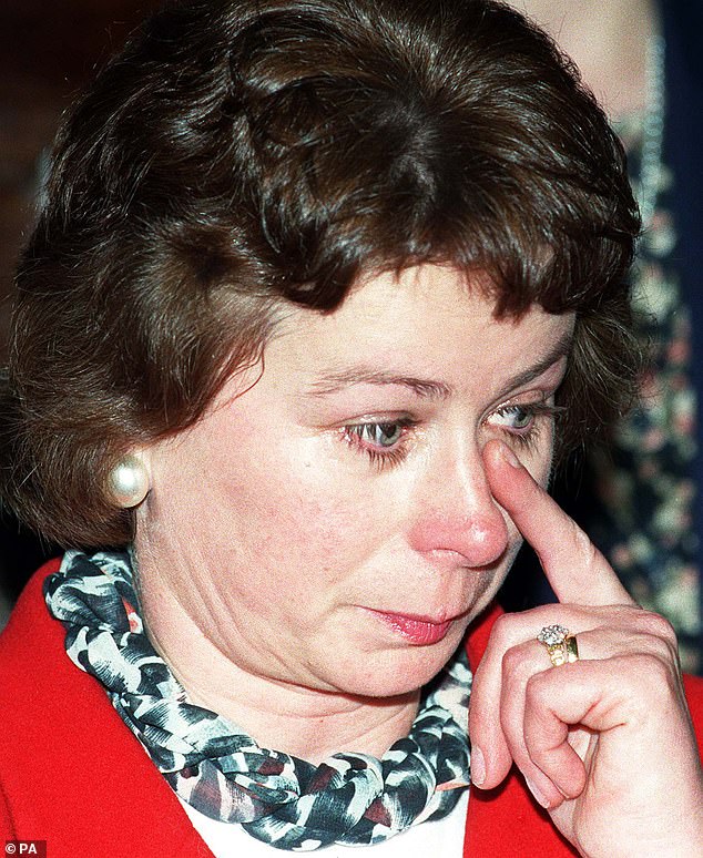 Eileen Harrild wipes away a tear in Westminster in November 1996 while she visited along with grieving Dunblane parents to listen to a critical debate on the Firearms (Amendment) Bill