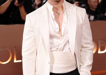 Two of Heated Rivalry's biggest stars launched a blistering attack at some of the show's fanbase over 'racist, homophobic and misogynistic' abuse online (pictured: Hudson Williams)