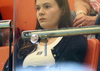 Holly Ramsay looked downcast as she watched her husband Adam Peaty compete in Edinburgh on Sunday