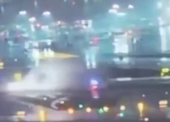 Horrific footage has revealed the moment an Air Canada plane collided with a fire truck as it crossed a runway at LaGuardia Airport, sending a huge spray of water and debris across the tarmac as the truck was flipped