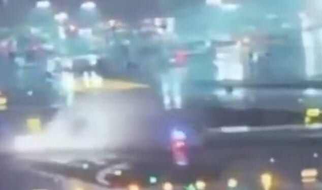 Horrific footage has revealed the moment an Air Canada plane collided with a fire truck as it crossed a runway at LaGuardia Airport, sending a huge spray of water and debris across the tarmac as the truck was flipped