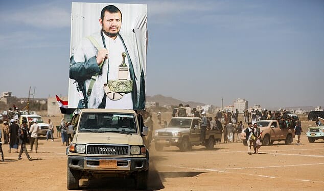 Houthi leader Abdul-Malik al-Houthi announced earlier this month that his terrorist organization is prepared to get involved in the ongoing conflict raging across the Middle East. The terrorist leader is pictured on a poster during a parade in Yemen in solidarity with Gaza in 2024