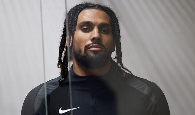 Saraiva (pictured inside a court in Lezha) who grew up in Reading from the age of four has been jailed for life