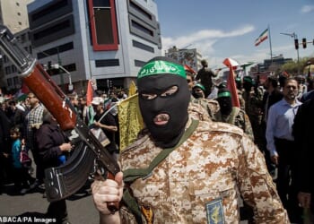 Iranians attend the funeral procession for seven Islamic Revolutionary Guard Corps members killed in a strike in Syria