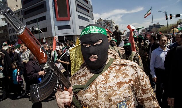 Iranians attend the funeral procession for seven Islamic Revolutionary Guard Corps members killed in a strike in Syria