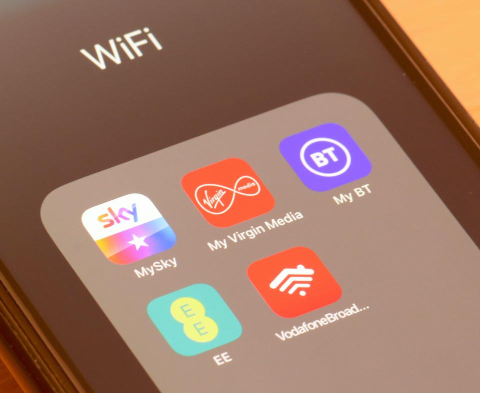 Smartphone screen displaying WiFi broadband provider apps, including MySky, My Virgin Media, My BT, EE, and VodafoneBroadband.