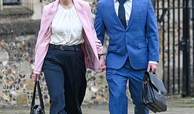 Christopher Trybus (right) is accused of driving his wife Tarryn Baird to suicide. He is seen outside court with his current wife Bea Trybus last month