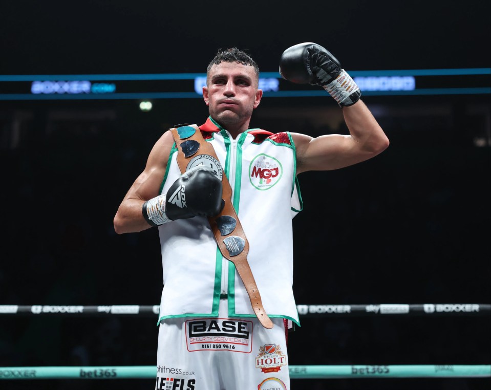 Michael Gomez Jr. celebrates his victory for the English Super-Featherweight Title.