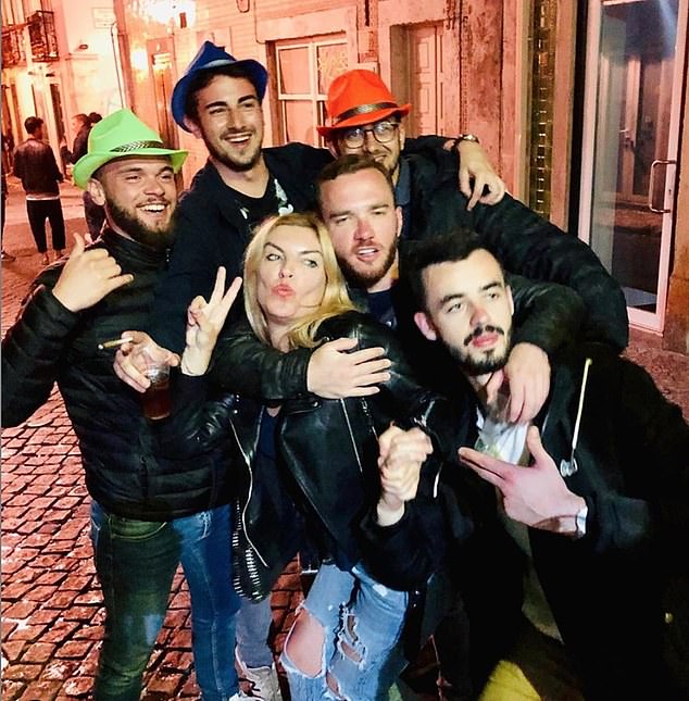 After her divorce, Gilly travelled extensively ¿ from Crete, to Mykonos and Ibiza ¿ staying at exclusive resorts (pictured  in Lisbon, Portugal, in 2019)