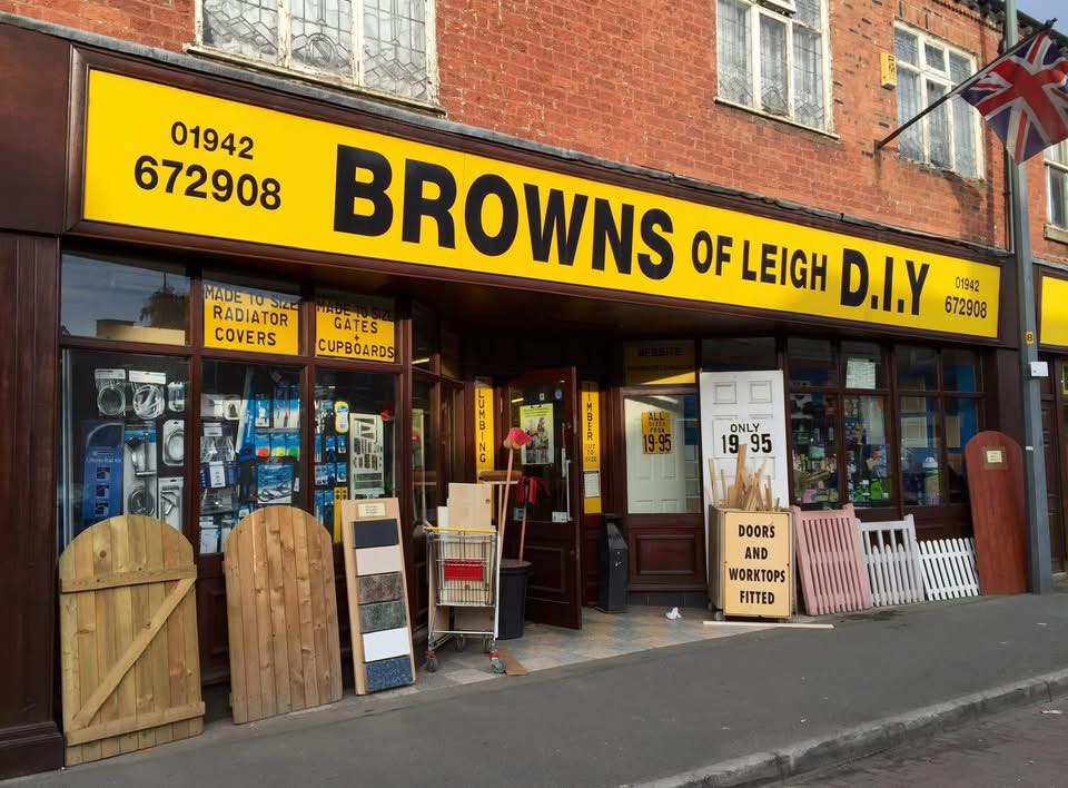 Exterior of Browns of Leigh D.I.Y. store with a yellow sign.