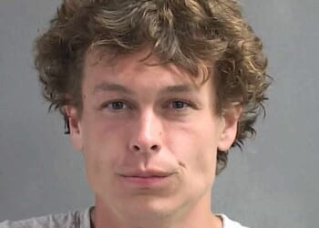 Chase Cruz, 28, was arrested on March 16 and was charged with loitering, prowling, and resisting arrest. He is pictured above in his police booking photograph