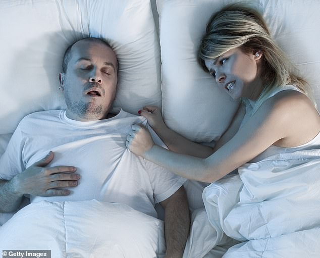 ‘He picks fluff out of his belly button, has piled on more than two stone, so now breathes heavily all the time and snores terribly at night,’ says one wife (picture posed by models)
