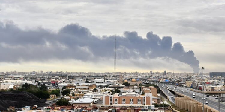 Iran fires missiles at American military bases across the Gulf and says US is 'negotiating with yourselves' - live updates