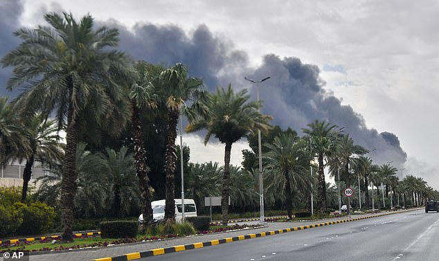 Smoke rises from Kuwait international airport after a drone strike on fuel storage in Kuwait City, Kuwait, Friday, Wednesday, March 25, 2026. (AP Photo)