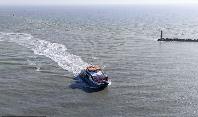 A group of people thought to be migrants arrive aboard a Border Force vessel travelling to Ramsgate in Kent on March 5 2026