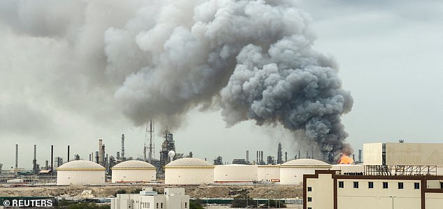 Smoke rises following a strike on the Bapco Oil Refinery, amid the U.S.-Israeli conflict with Iran, on Sitra Island Bahrain, March 9, 2026. REUTERS/Stringer    REFILE - UPDATING LOCATION IN HEADLINE