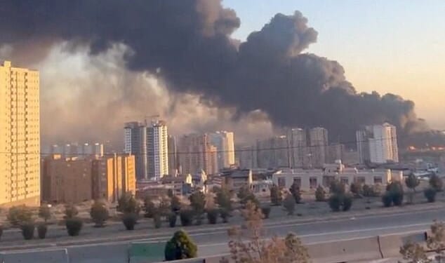 Deadly strikes continued to rain down on Iran early Wednesday morning. Smoke is seen rising from a reported airstrike in Tehran on Tuesday