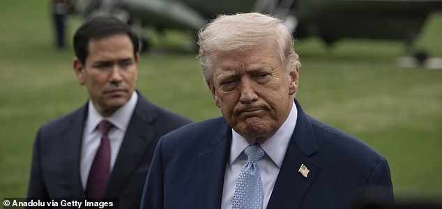 WASHINGTON DC, UNITED STATES - MARCH 20: United States President Donald Trump (R) speaks to the press before his departs the White House en route Miami, Florida on March 20, 2026, in Washington DC. Also The United States Secretary of State Marco Rubio (L) is seen. (Photo by Celal Gunes/Anadolu via Getty Images)