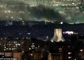 Smoke plumes billow from the site of airstrikes near Azadi Tower in western Tehran on March 10, 2026