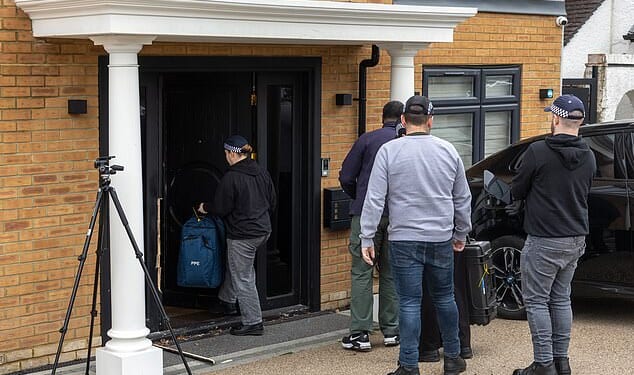 Counter-terrorism officers arrested four men with Iranian and dual British-Iranian citizenship on Friday at addresses in Harrow, Watford and Barnet. Pictured: Police at the Watford property