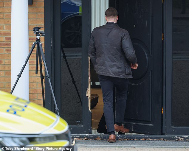 Yesterday, police were seen carrying out searches of a property in Watford (pictured) where a 52-year-old man was arrested in front of his wife and teenage daughter