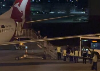 The Iranian women's soccer team have left Australia (pictured are the women disembarking a flight from the Gold Coast to Sydney to catch a transfer bus to their international flight)