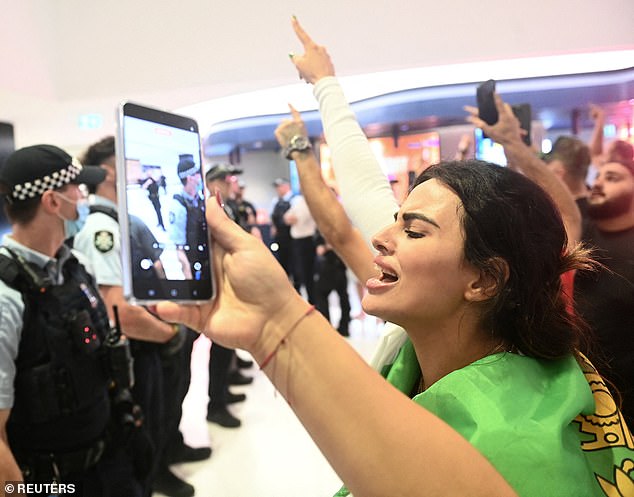 Demonstrators in Sydney urged the women to accept the visas