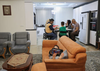 Iranians caught between unremitting attack, unyielding regime