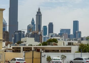 Katie Price's new husband lived in a rundown bungalow in Dubai with his dad weeks before marrying the model - who claims he's just splashed out on a £36million mansion