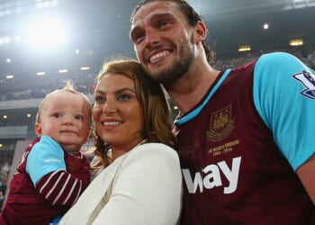 Footballer Andy Carroll poses with then fiancee Billi Mucklow and their son Arlo in 2016