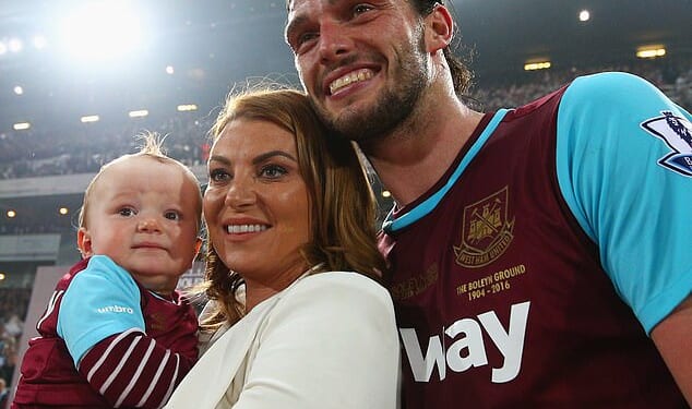 Footballer Andy Carroll poses with then fiancee Billi Mucklow and their son Arlo in 2016