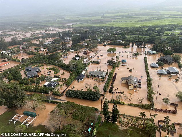 A flooded neighborhood in Waialua on the north shore of Oahu, Hawaii. Locals have been ordered to evacuate immediately