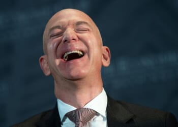 Jeff Bezos laughs at the Economic Club of Washington’s Milestone Celebration event on September 13, 2018.